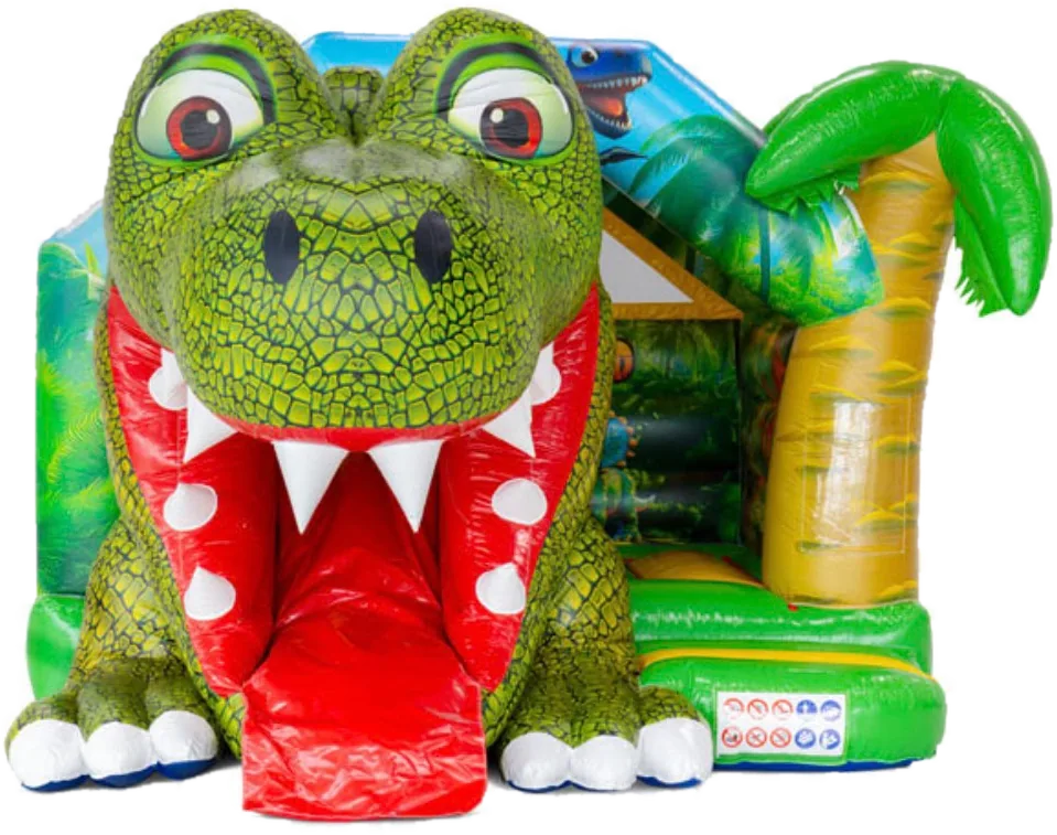 Dino-Hüpfburg mit großem T-Rex-Kopf, aus dessen Maul eine rote Rutsche kommt